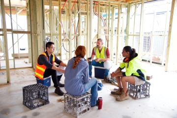 iStock-890101686%20-%20Diverse%20construction%20workers%20meeting%20sitting%20down%20-%20360%20x%20240.jpg